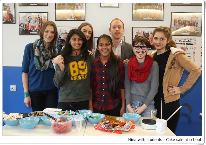 Nina With students - Cake sale at school